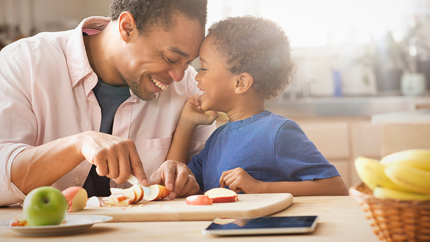 How to Kick Your Stress-Eating Habit - Father Teaching Son How to Eat Healthy