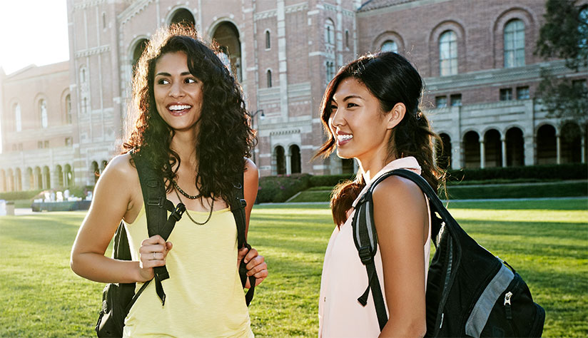 Female students talking on college campus
