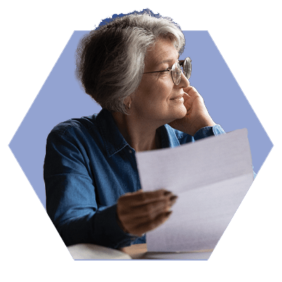 Older Woman Looking at Paperwork