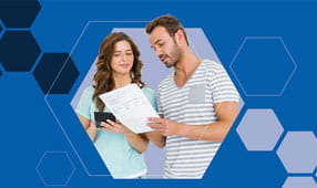 Couple Looking at Financial Paperwork