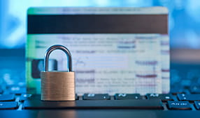 Picture of Lock and Credit Card on top of Keyboard