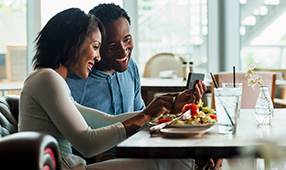 African American Couple Enjoying Meal
