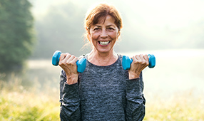 Female Senior Lifting Weights