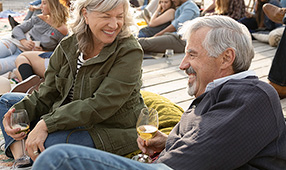 Older couple relaxing outside