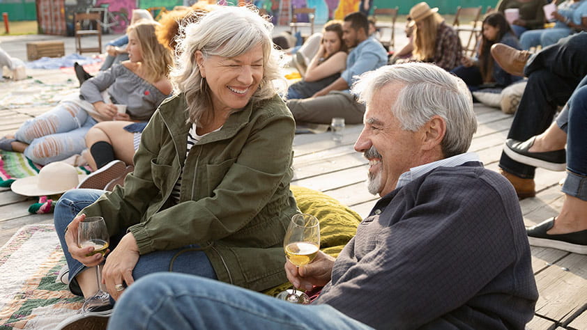 Older couple relaxing outside