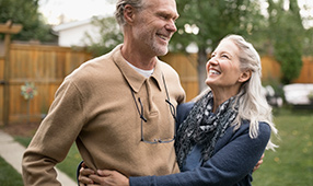 How Much Do You Really Need to Retire - Old couple smiling at each other