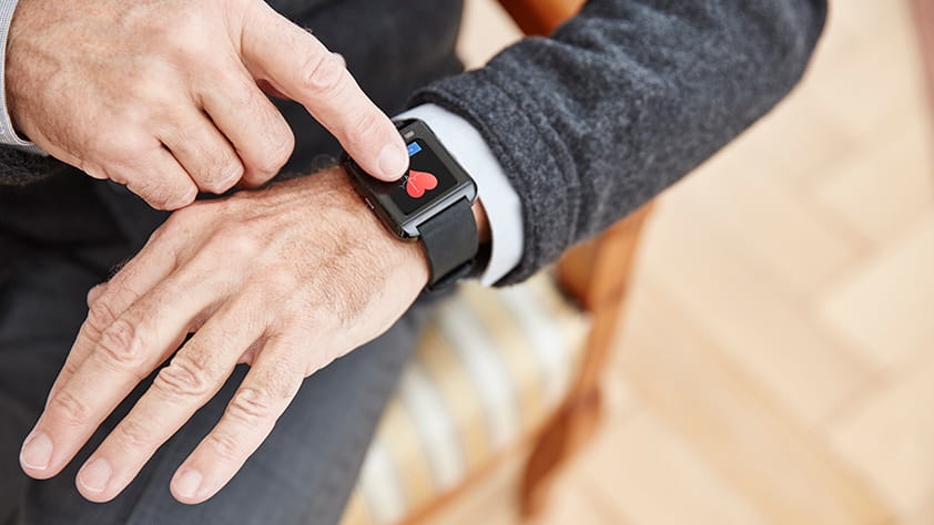 Senior man wearing a smart watch