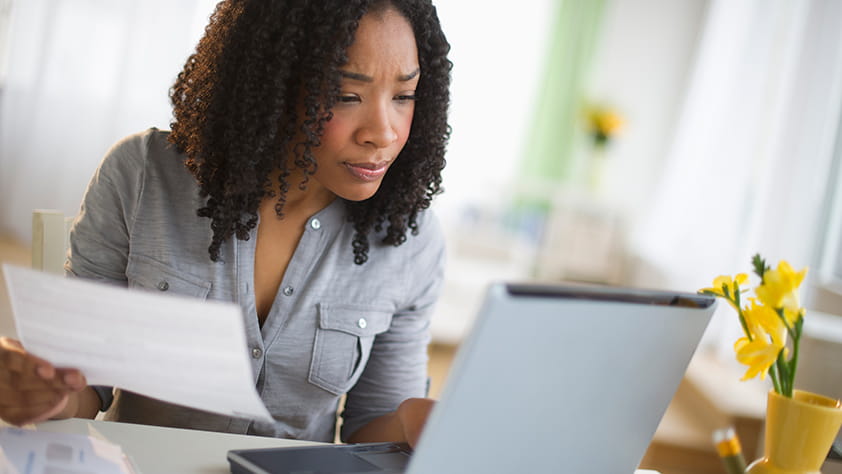 Protect Your Pension Benefits - Woman Working on Her Laptop