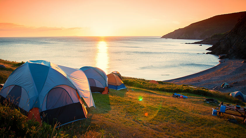 Tents Along a Seashore at Sunset