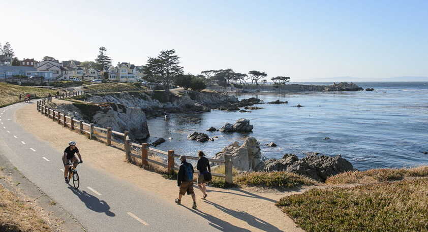Bike riders and walkers on the Monterey Bay Coastal Recreation Trail in California