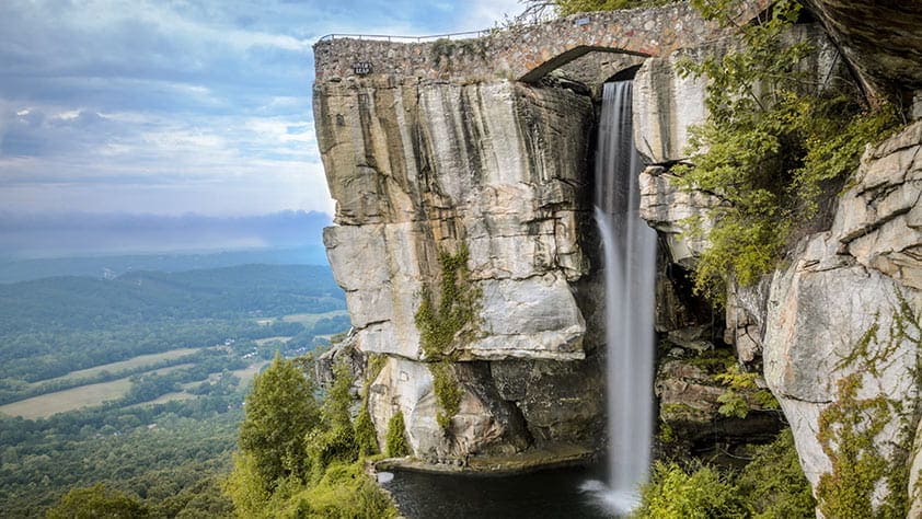 Scenic view of waterfall and valley