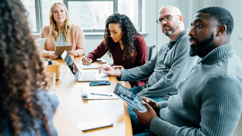 Group of adults having a meeting