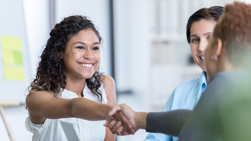 Teacher Candidate Shaking Hands at an Interview