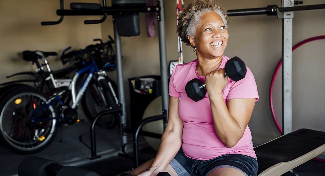 Mature African-American Woman Lifting Weights