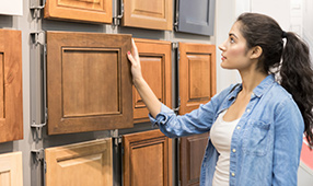 Woman Looking at Custom Cabinetry Options