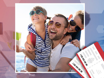 A father with his children at the beach, laughing and having a good time