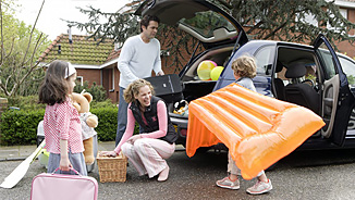 NEA AD&D Insurance - Family Packing Up the Car