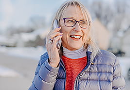 Senior Woman Talking on a Cellphone - NEA Wireless
