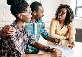 Financial Advisor Consulting With Clients