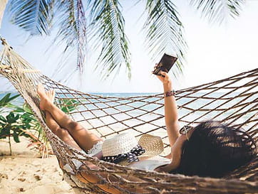 Woman Relaxing in a Hammock