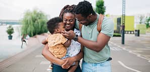 Happy family having fun together outdoors
