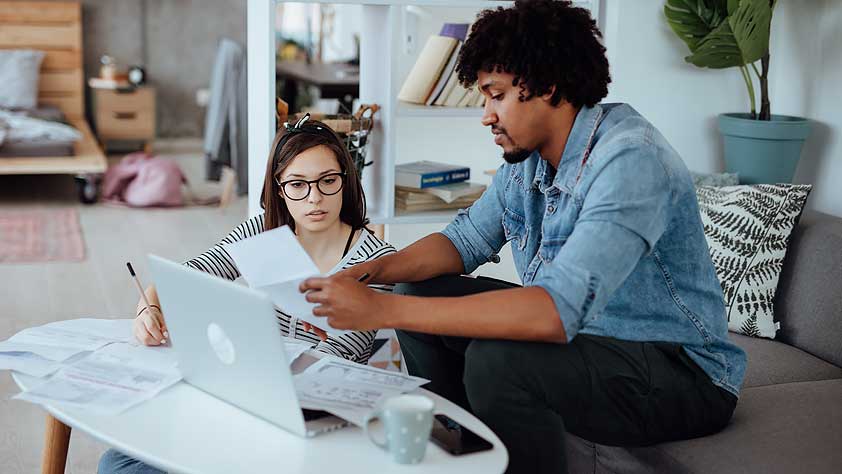 Couple checking home finances