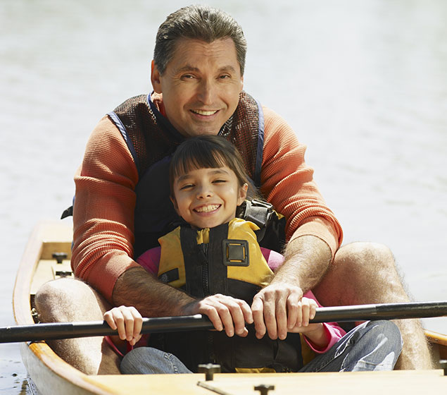 Father and daughter in kayak